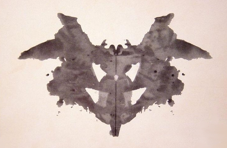 Rorschach card I, a black and grey inkblot