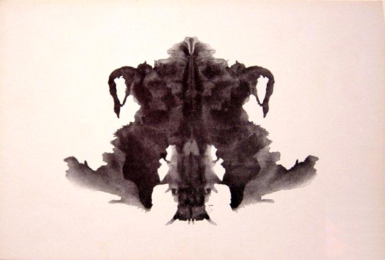 Rorschach card IV, a dark, heavily shaded inkblot