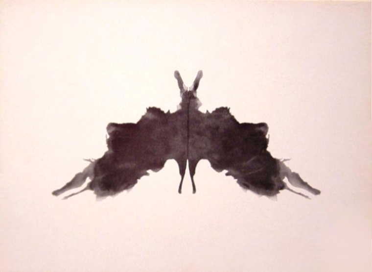 Rorschach card V, a simple black inkblot