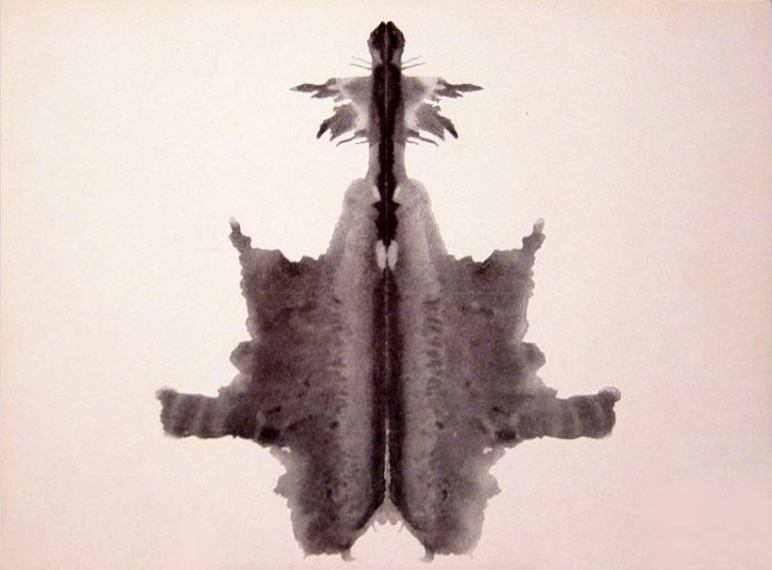 Rorschach card VI, a shaded black and grey inkblot