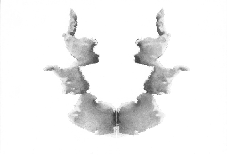 Rorschach card VII, a light grey inkblot